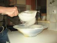 Clean flour by sifting 